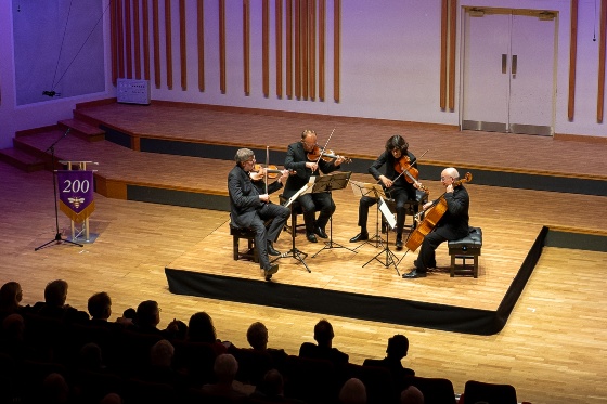 The Quatuor Danel perform on stage.